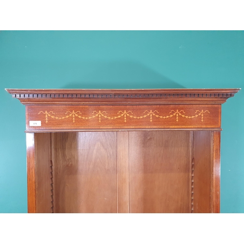 575 - A reproduction mahogany open Bookcase with dentil frieze cornice above four adjustable shelves on pl... 