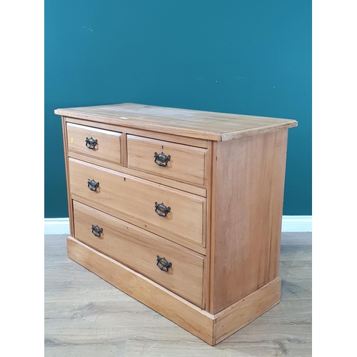 577 - A satinwood Chest of two short, two long Drawers, 2ft 8