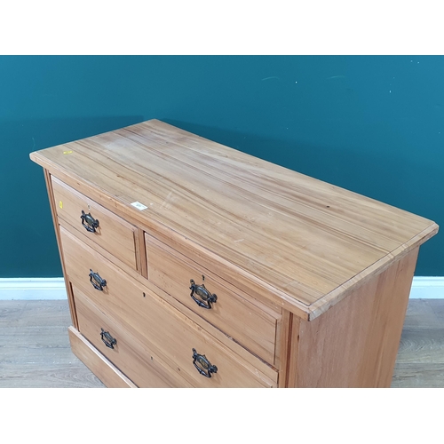 577 - A satinwood Chest of two short, two long Drawers, 2ft 8