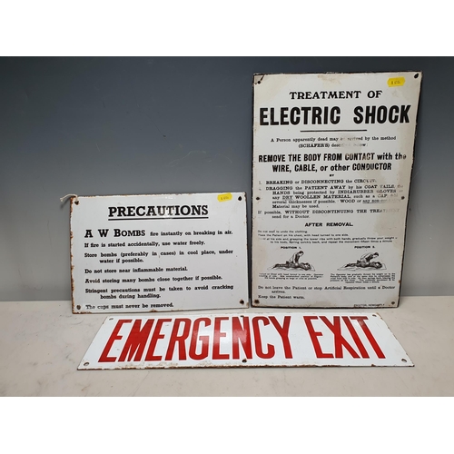 588 - Three enamel Signs including 'Emergency Exit', 'Precautions -A W Bombs fire instantly on breaking in... 