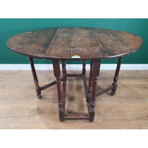 6 - A small antique oak Gateleg Table on turned supports, A/F. (R2).