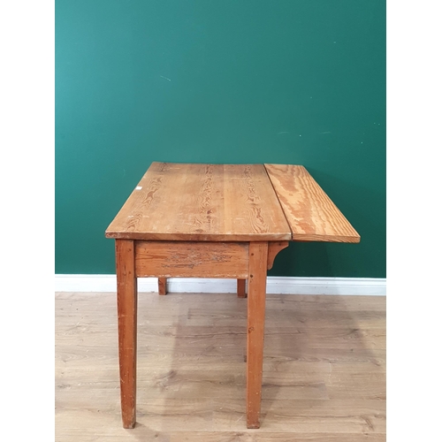 600 - A Pine Kitchen Table with dropleaf and single fitted drawer on square supports, 2ft 6