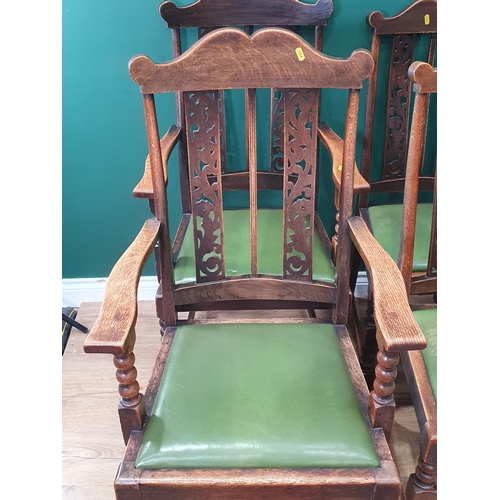 602 - A set of six oak framed Dining Chairs with pierced carved backrests, green upholstered drop in seats... 