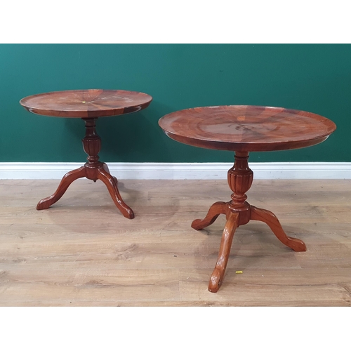 617 - A pair of segmented circular dish topped Tripod Tables on turned column and splayed supports, 21