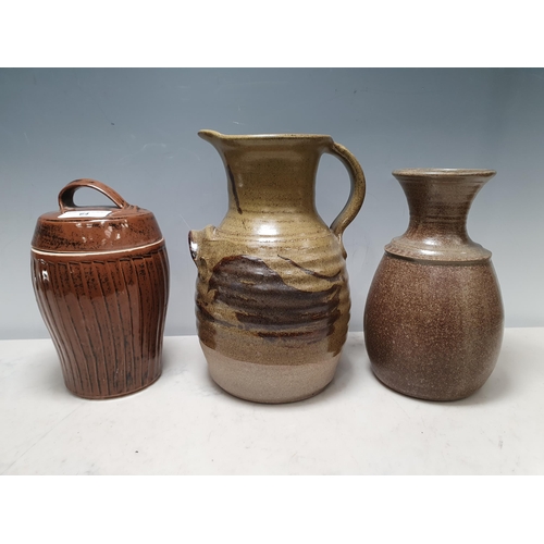 64 - A large stoneware Pitcher with olive green and brown glaze Pot & cover, 9in and a stoneware Vase by ... 