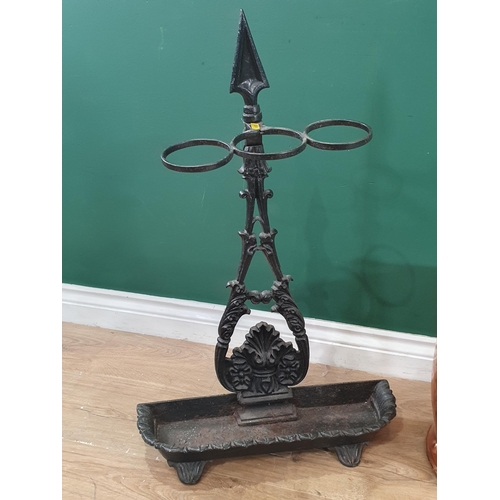 688 - A Victorian cast iron Stick Stand with floral decoration, 2ft 6in H x 1ft 8in W and a copper Coal Bu... 