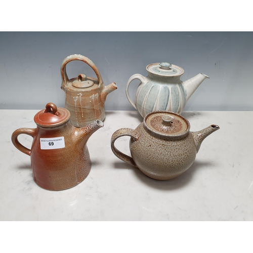 69 - A stoneware Teapot with orange peel salt glaze, impressed mark, and three other studio Teapots