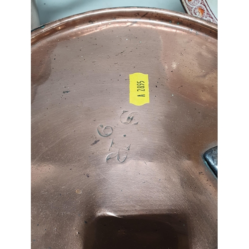 694 - A Copper Pan and Lid stamped 