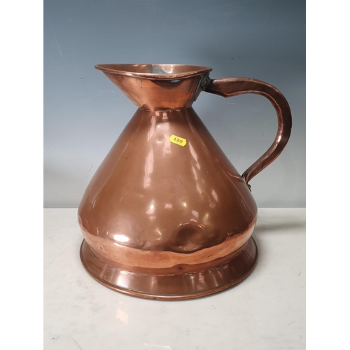 696 - A copper Two Gallon Jug with indistinct makers name, 1ft High. (R7).