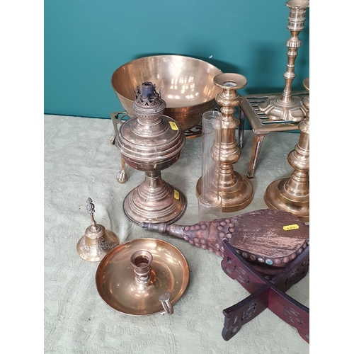 697 - A box of assorted metalware including brass Candlesticks, two brass Trivets, a plated Candelabra, a ... 