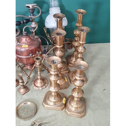 697 - A box of assorted metalware including brass Candlesticks, two brass Trivets, a plated Candelabra, a ... 