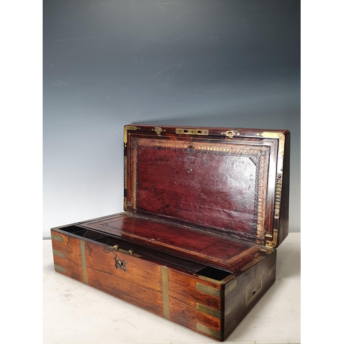 698 - An antique rosewood brass bound Writing Slope with leather gilt tooled writing surface, inscribed 