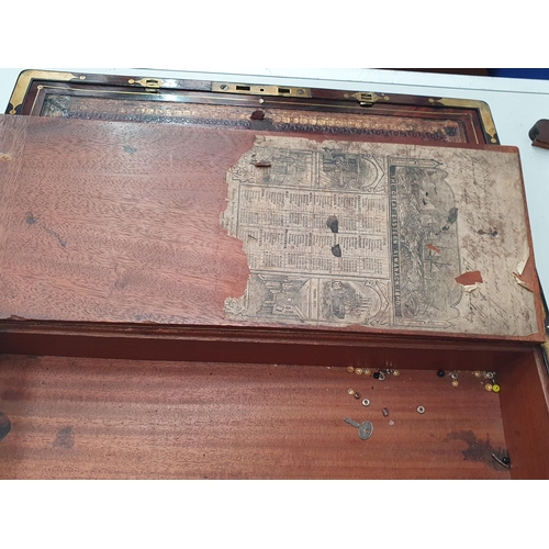 698 - An antique rosewood brass bound Writing Slope with leather gilt tooled writing surface, inscribed 