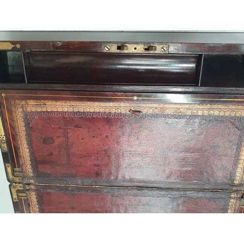 698 - An antique rosewood brass bound Writing Slope with leather gilt tooled writing surface, inscribed 