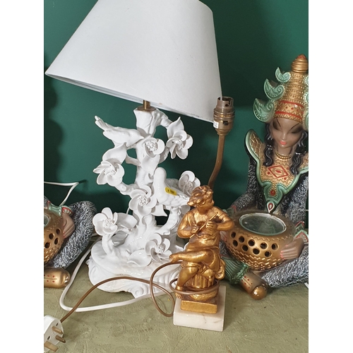 710 - A pair of modern seated figure Lamps, a white ceramic bird Lamp, A/F, and four other Table Lamps, Th... 