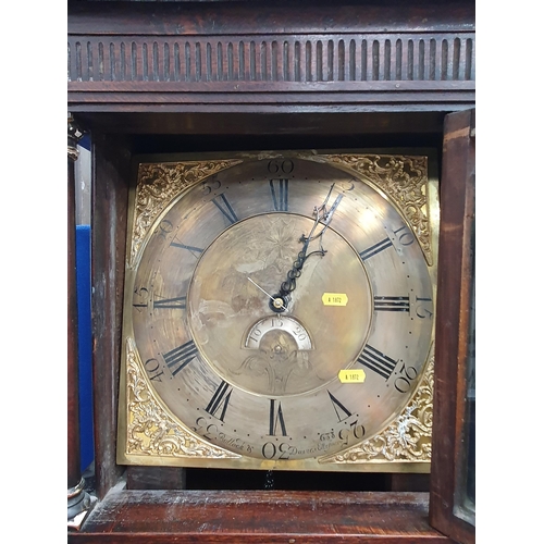 720 - An antique oak cased Long Cased Clock with square brass Dial with silvered chapter ring inscribed 