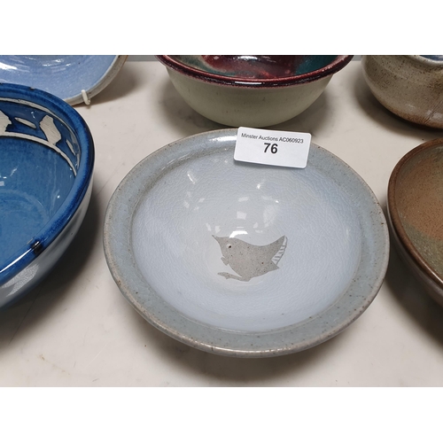 76 - Eight Studio pottery/stoneware Bowls with various glazes, one decorated with a wren, 8- 5in various ... 