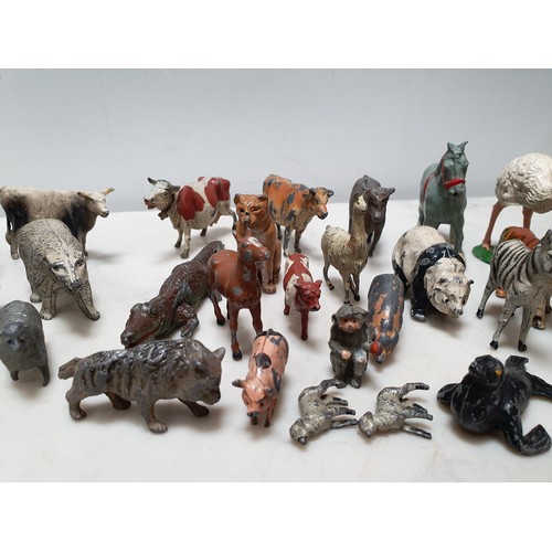 276 - A quantity of Britains and other hollow casts models including Cows, Horses, Bears, Panda etc (R4)