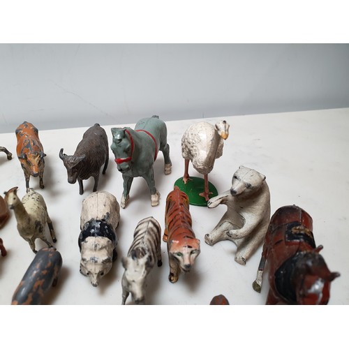 276 - A quantity of Britains and other hollow casts models including Cows, Horses, Bears, Panda etc (R4)