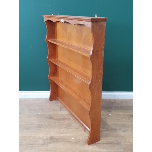 38 - A light oak Dresser Rack, 3ft 7