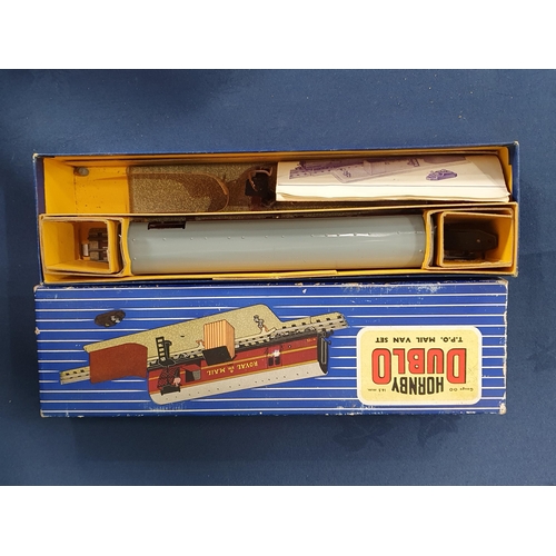 702 - A boxed Hornby Dublo 3232 Co-Co diesel Locomotive and a boxed T.P.O. Mail Van Set (R4)