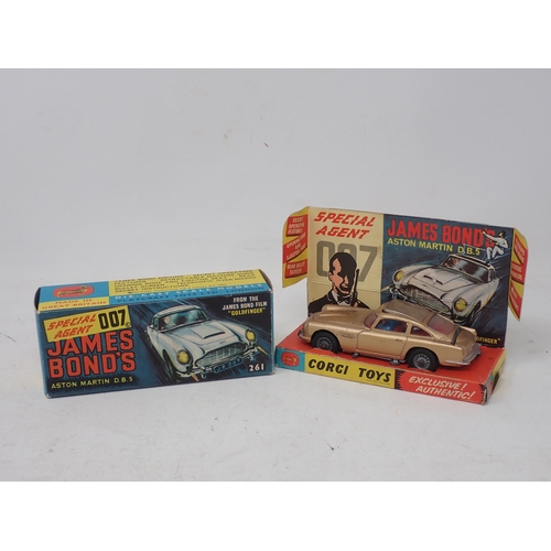 228 - Corgi Toys 261 James Bond 007 Aston Martin DB5 with figures and instructions, boxed with display