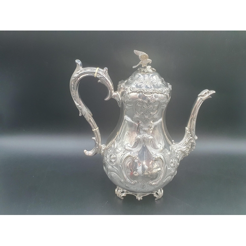 108 - A Victorian plated four piece Tea and Coffee Service floral embossed with bird finials (R1)