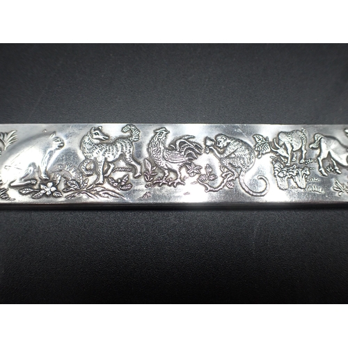 113 - A Chinese white metal Bar decorated animals including horse, monkey, lion, dragon, snake, rats etc, ... 