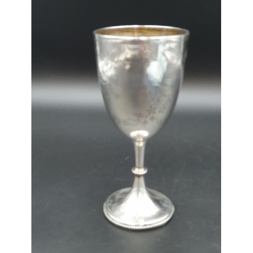 136 - A Victorian silver Goblet with floral swag engraving and inscription, London 1877, 152gms