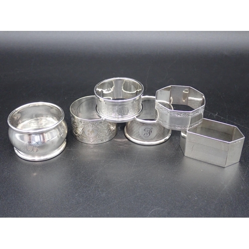 149 - Five various silver Napkin Rings and one plated