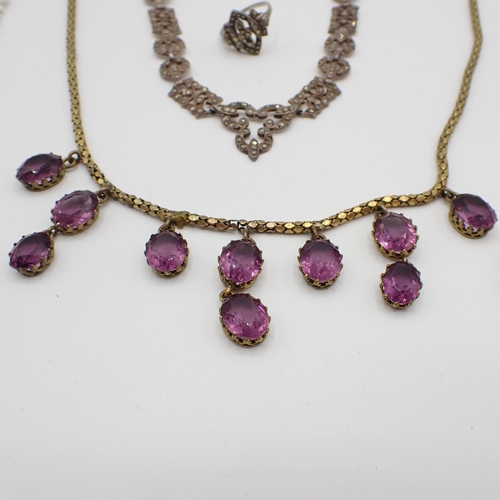 169 - A silver Necklace, Ring and Earrings set marcasite, a gilt metal Fringe Necklace set purple paste, a... 