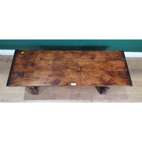 18 - A reproduction oak Coffee Table on turned supports united by stretchers, 1ft 3