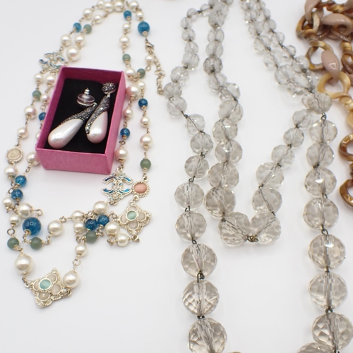 205 - A small collection of Costume Jewellery including; beads, faux pearls and drop Earrings