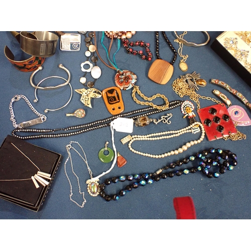 212 - A box of Costume Jewellery