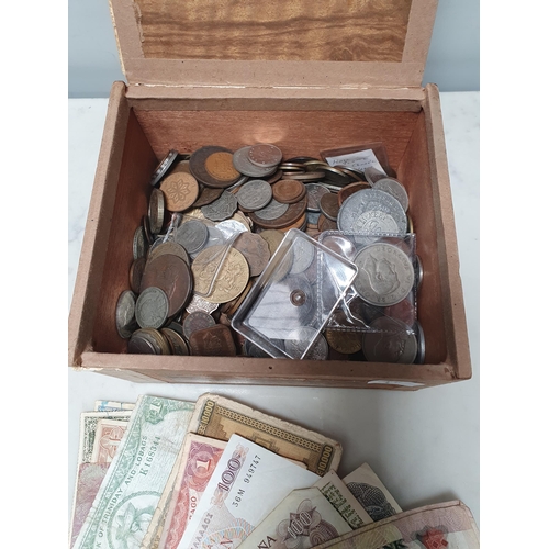 274 - A cigar box of British and World Coins and Tokens, along with a selection of world Banknotes