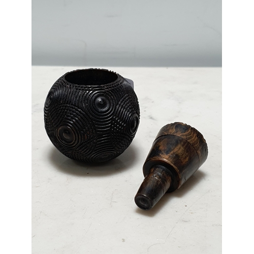 285 - A 19th Century carved Ball with circular slot-in section and carved concentric circles, 2 1/4in H