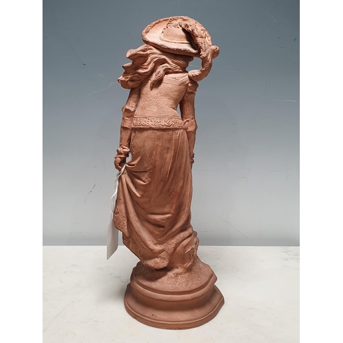 287 - A Gerbing & Stephan, terracotta Figure of a Lady in a flowing dress with hat. Impressed 