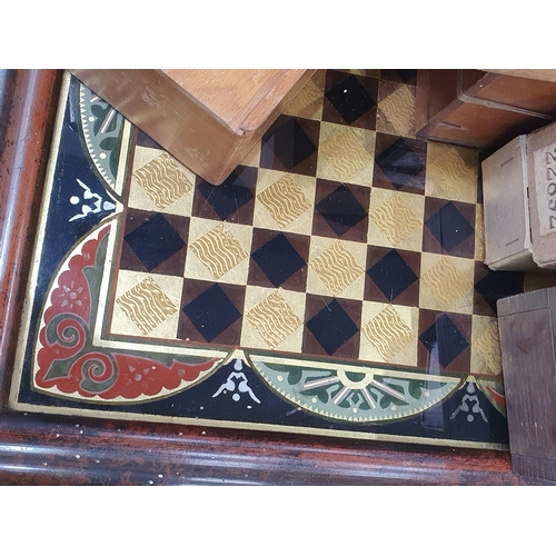 325 - A quantity of Chess Sets, Domino Sets and a framed glass Chess Board. (R5)