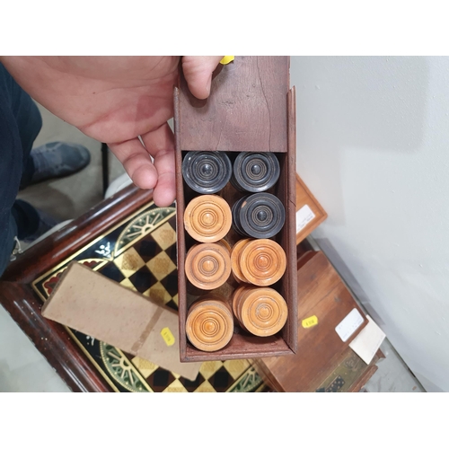 325 - A quantity of Chess Sets, Domino Sets and a framed glass Chess Board. (R5)