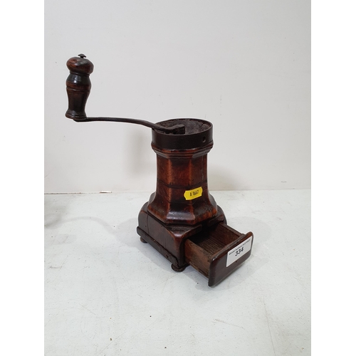 334 - An early 18th Century treen Coffee Grinder with turned wood handle and draw to base, 7in H, A/F. (R5... 