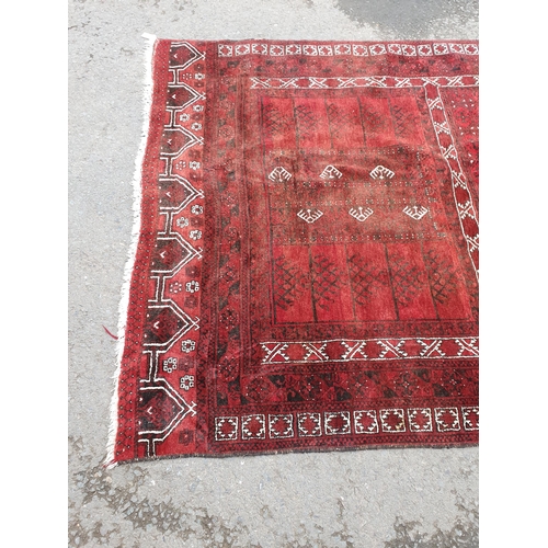 36 - An Afghan Rug 8ft 11in x 5ft 10in (R3)