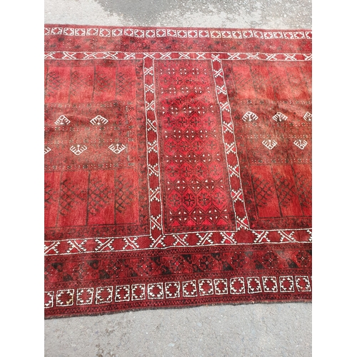 36 - An Afghan Rug 8ft 11in x 5ft 10in (R3)