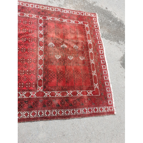 36 - An Afghan Rug 8ft 11in x 5ft 10in (R3)