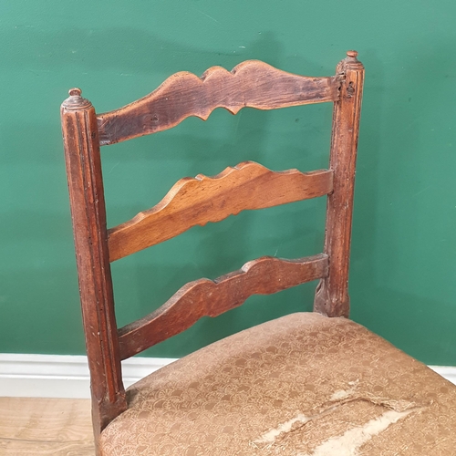 40 - A near pair of Antique continental Ladderback Chairs with stuff-over seats, on shaped supports and s... 