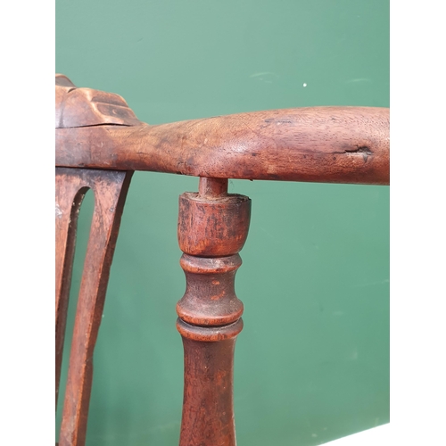 46 - A Georgian walnut corner Elbow Chair with red drop in seat mounted upon cabriole supports and pad fe... 