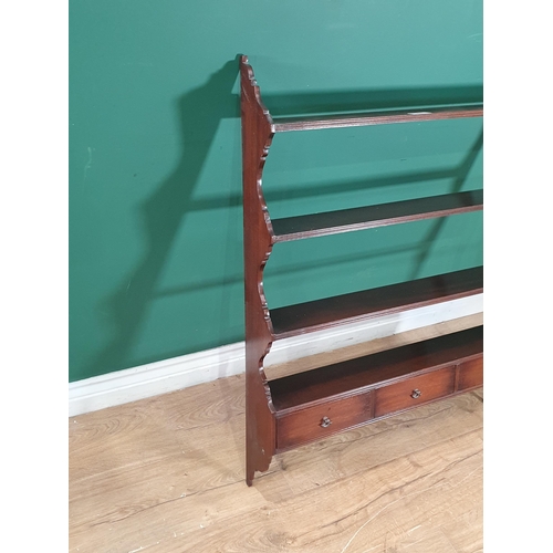 481 - A modern mahogany set of Wall Shelves with shaped ends and three fitted drawers, 3ft 2