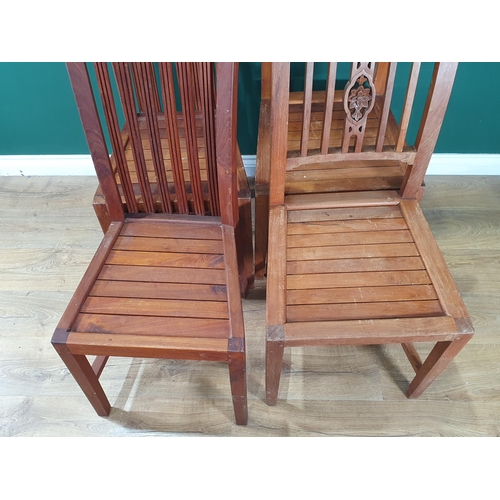 483 - A pair of hardwood Chairs with carved floral decoration, and another pair of hardwood Chairs. (R3).