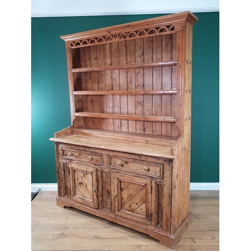 487 - A reclaimed pine Dresser and rack fitted two drawers above pair of cupboard doors 6ft 5in H x 4ft 11... 