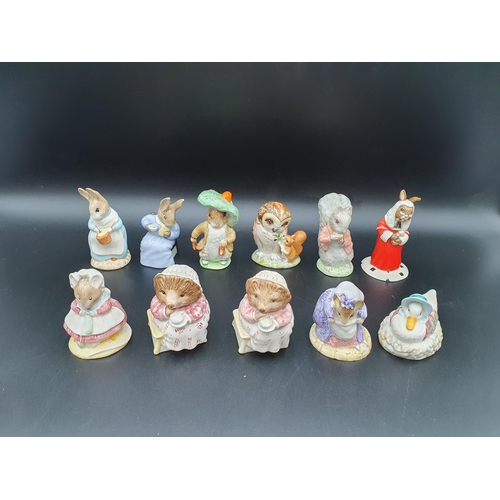 54 - Eleven Beatrix Potter Figures by Beswick, Doulton, Royal Albert, etc including Cotton Tail, Timmy Ti... 