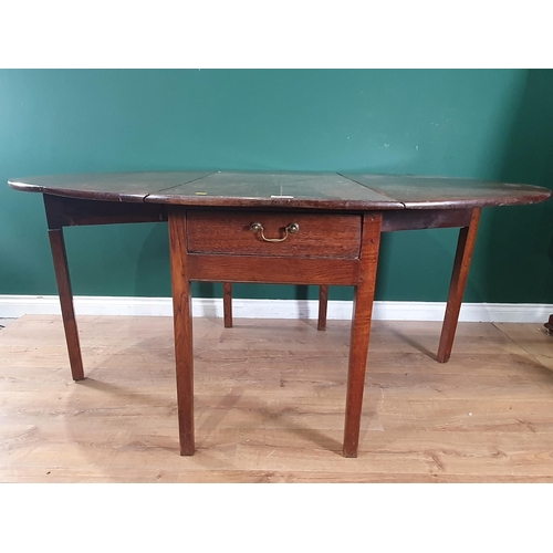 546 - An oak Gateleg Table with two fitted drawers, raised on square supports (Legs have been Tipped), 2ft... 